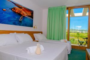 A bed or beds in a room at Residence al Palace