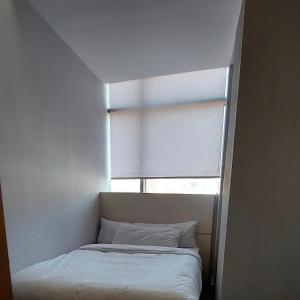Postel nebo postele na pokoji v ubytování El Ghanami Hotel