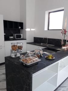 A kitchen or kitchenette at La Corte dei Pozzi