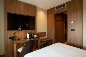 Postel nebo postele na pokoji v ubytování Hotel Granada Center