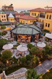 an overhead view of a building with tables and umbrellas at Four Seasons Hotel Istanbul at Sultanahmet in Istanbul