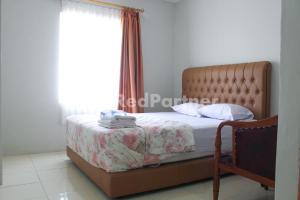 Letto o letti in una camera di Brahma Hotel Mitra RedDoorz