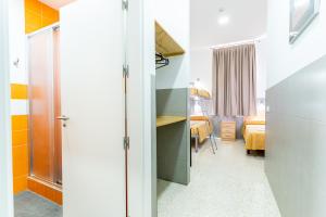 Postel nebo postele na pokoji v ubytování Albergue Inturjoven Malaga