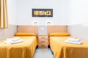 Postel nebo postele na pokoji v ubytování Albergue Inturjoven Malaga