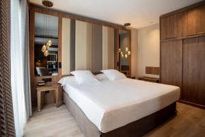 Postel nebo postele na pokoji v ubytování Hotel Granada Center