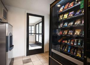 a refrigerator filled with lots of food and drinks at Motel 6-Buena Park, CA - Knotts Berry Farm - Disneyland in Buena Park