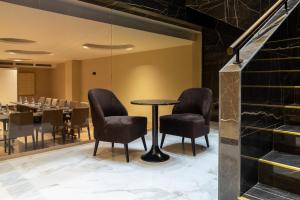 Posezení v ubytování Hotel Granada Center