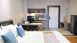 Istumisnurk majutusasutuses KTK Pattaya Hotel & Residence