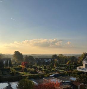 a view of a park with buildings and trees at Haus am Mühlenkämpchen - Schönblick in Radevormwald