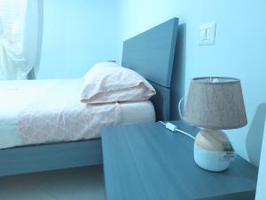 Postel nebo postele na pokoji v ubytování Casa vacanze Perfecta Laetitia Assisi