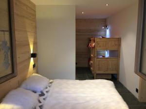 Posteľ alebo postele v izbe v ubytovaní Appartement Bois Colombes Châtel Réservation