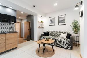 Η κουζίνα ή μικρή κουζίνα στο Apartamenty Obora