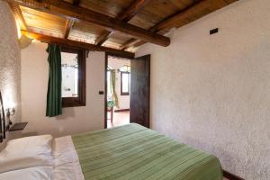 A bed or beds in a room at Donna Vittoria - Grande