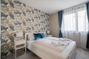 Posteľ alebo postele v izbe v ubytovaní Navy Angel Apartment with balcony