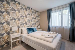 Posteľ alebo postele v izbe v ubytovaní Navy Angel Apartment with balcony + 17 fotografií