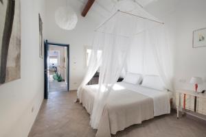 Posteľ alebo postele v izbe v ubytovaní AMORE RENTALS - Villa Ambretta + 37 fotografií