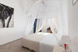 Posteľ alebo postele v izbe v ubytovaní AMORE RENTALS - Villa Ambretta