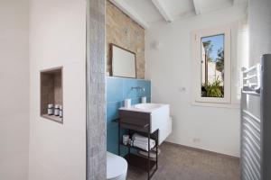 Kúpeľňa v ubytovaní AMORE RENTALS - Villa Ambretta