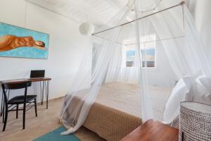 Posteľ alebo postele v izbe v ubytovaní AMORE RENTALS - Villa Ambretta