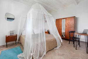 Posteľ alebo postele v izbe v ubytovaní AMORE RENTALS - Villa Ambretta