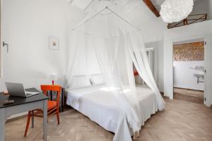Posteľ alebo postele v izbe v ubytovaní AMORE RENTALS - Villa Ambretta