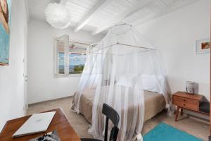 Posteľ alebo postele v izbe v ubytovaní AMORE RENTALS - Villa Ambretta