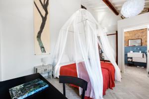 Posteľ alebo postele v izbe v ubytovaní AMORE RENTALS - Villa Ambretta