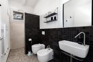 Kúpeľňa v ubytovaní AMORE RENTALS - Villa Ambretta