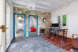 Televízia a/alebo spoločenská miestnosť v ubytovaní AMORE RENTALS - Villa Ambretta