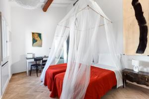 Posteľ alebo postele v izbe v ubytovaní AMORE RENTALS - Villa Ambretta