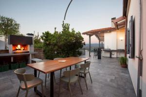 Balkón alebo terasa v ubytovaní AMORE RENTALS - Villa Ambretta