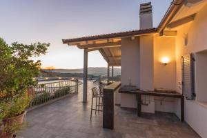 Balkón alebo terasa v ubytovaní AMORE RENTALS - Villa Ambretta
