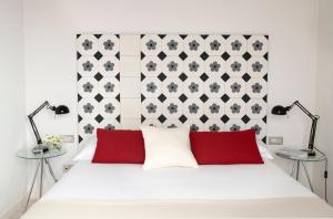 Postel nebo postele na pokoji v ubytování Eric Vökel Boutique Apartments - BCN Suites