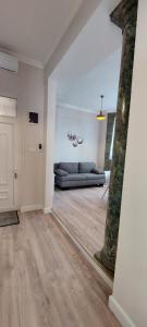 Łóżko lub łóżka w pokoju w obiekcie Castle Apartman ****
