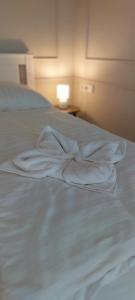 Łóżko lub łóżka w pokoju w obiekcie Castle Apartman ****