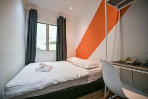 Postel nebo postele na pokoji v ubytování Meta Hotel