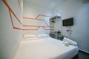 Postel nebo postele na pokoji v ubytování Meta Hotel
