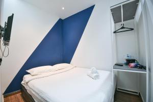 Postel nebo postele na pokoji v ubytování Meta Hotel