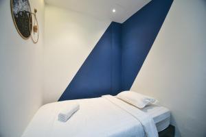 Postel nebo postele na pokoji v ubytování Meta Hotel