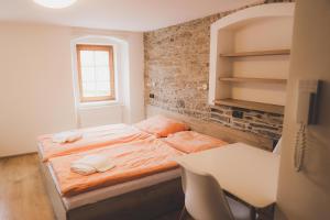 Posteľ alebo postele v izbe v ubytovaní Apartmány Jurica Boží Dar 88