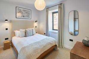 a bedroom with a bed and a window at Host & Stay - Taylor Street in Seahouses