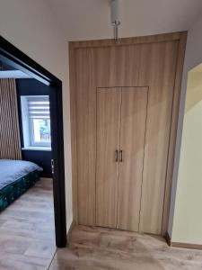 Posteľ alebo postele v izbe v ubytovaní PocztowaResort