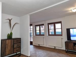 TV a/nebo společenská místnost v ubytování Appartment Montfort