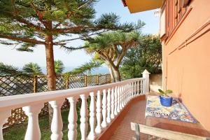 A balcony or terrace at Villa Petite Paradise