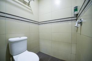 Koupelna v ubytování Meta Hotel