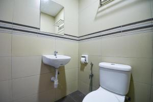 Koupelna v ubytování Meta Hotel