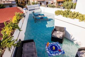 Bazén v ubytovaní Palazzo De Gregorio Apartment Pompei alebo v jeho blízkosti
