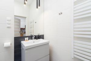 Kúpeľňa v ubytovaní Kraków Trendy Studio Apartments by Noclegi Renters