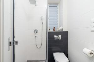 Kúpeľňa v ubytovaní Kraków Trendy Studio Apartments by Noclegi Renters