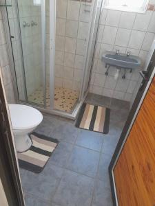 Ванная комната в Ombo Rest Camp